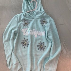 Light blue hoodie, never worn. It’s comfy in a light material